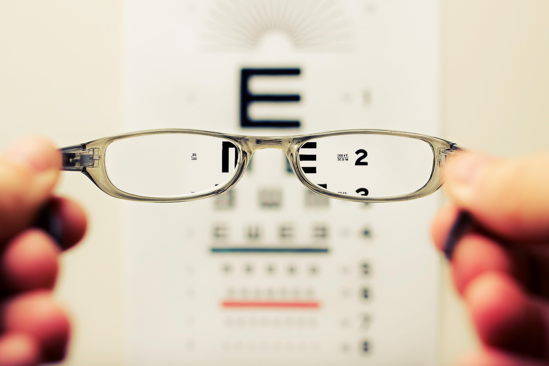 Glasses in front of vision chart