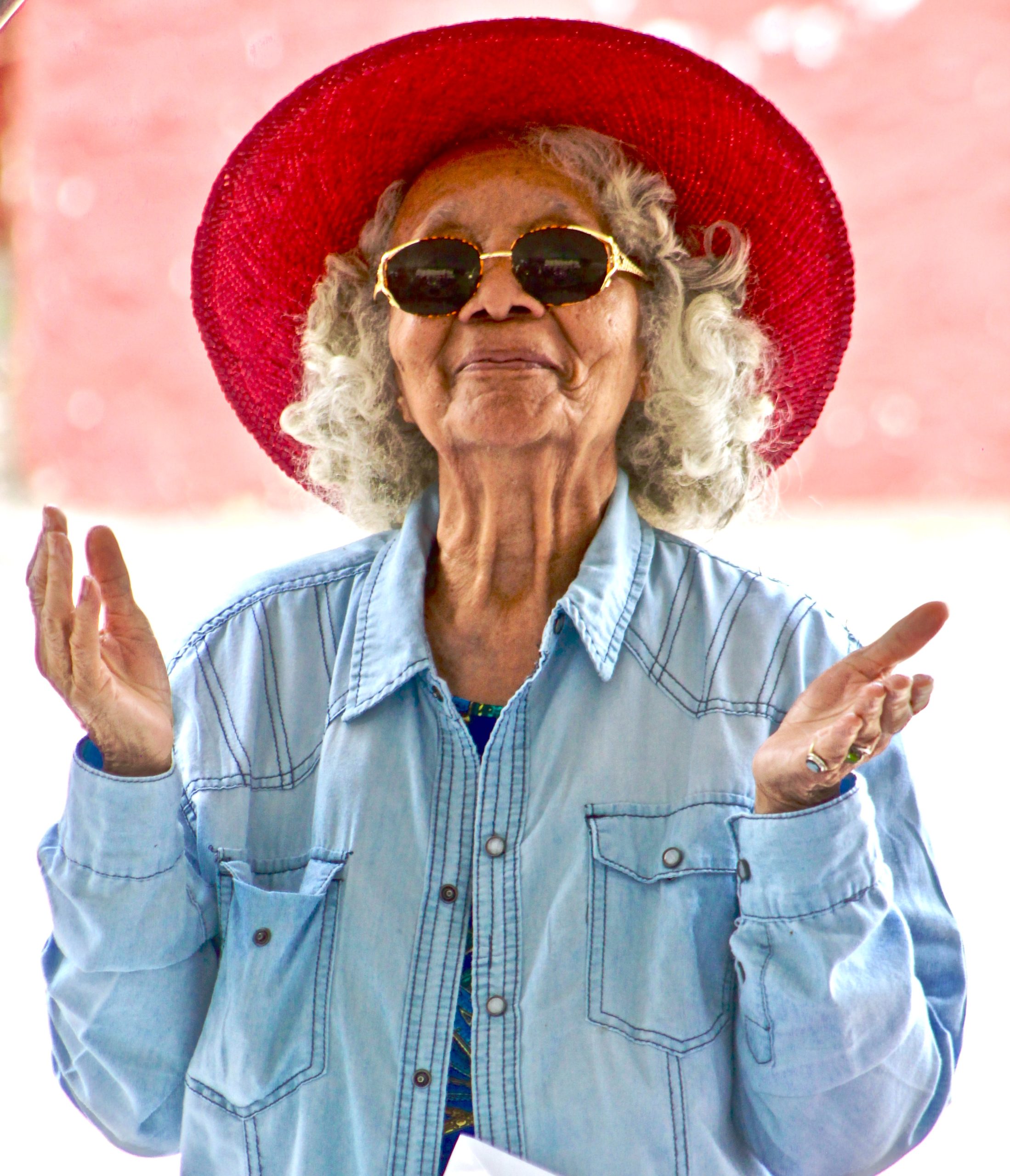 senior woman with a red hat