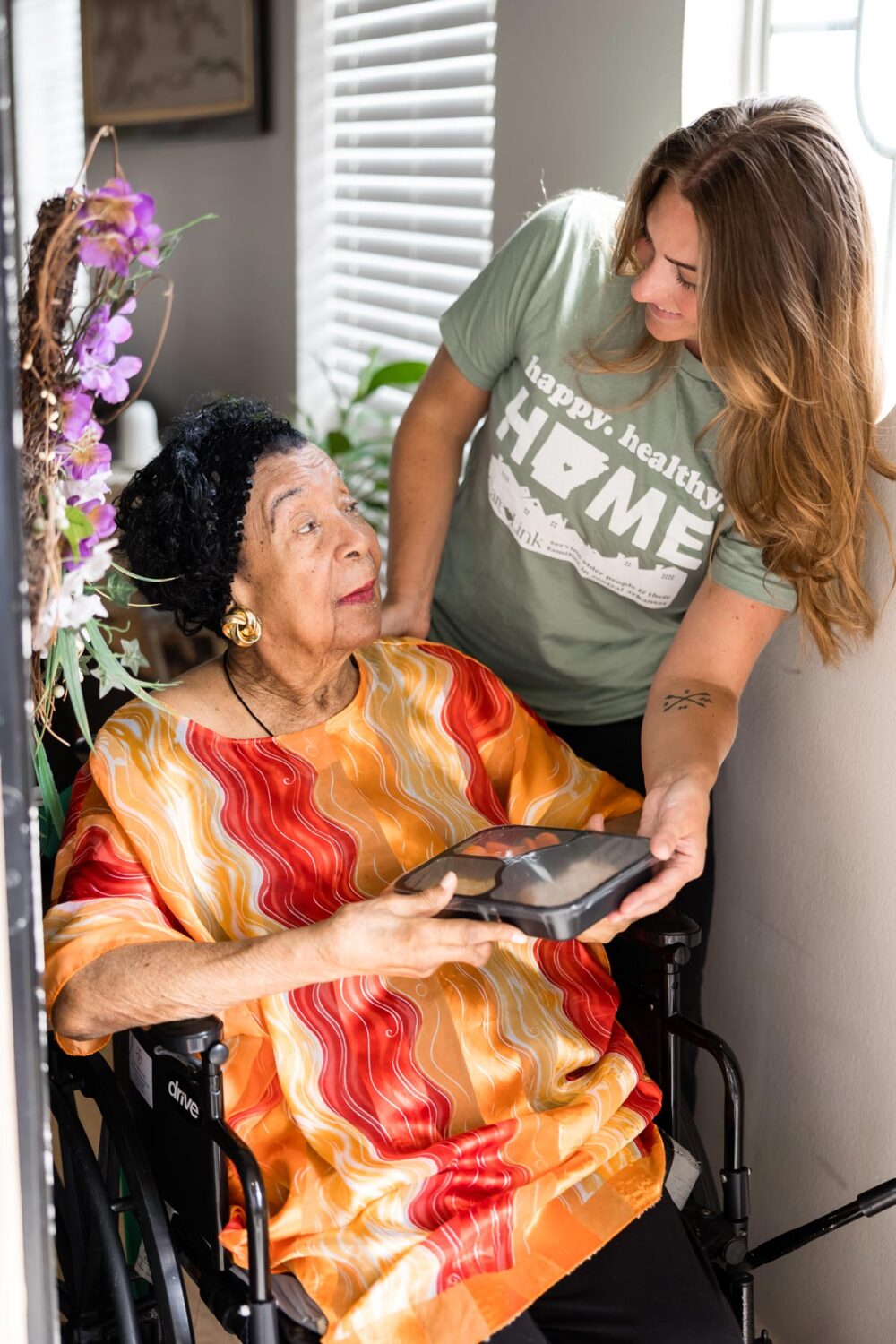 Meals on Wheels volunteer and recipient